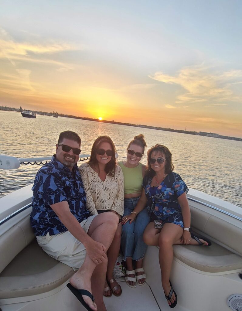 Sunset dolphin cruise boat with dolphins in Orange Beach Alabama