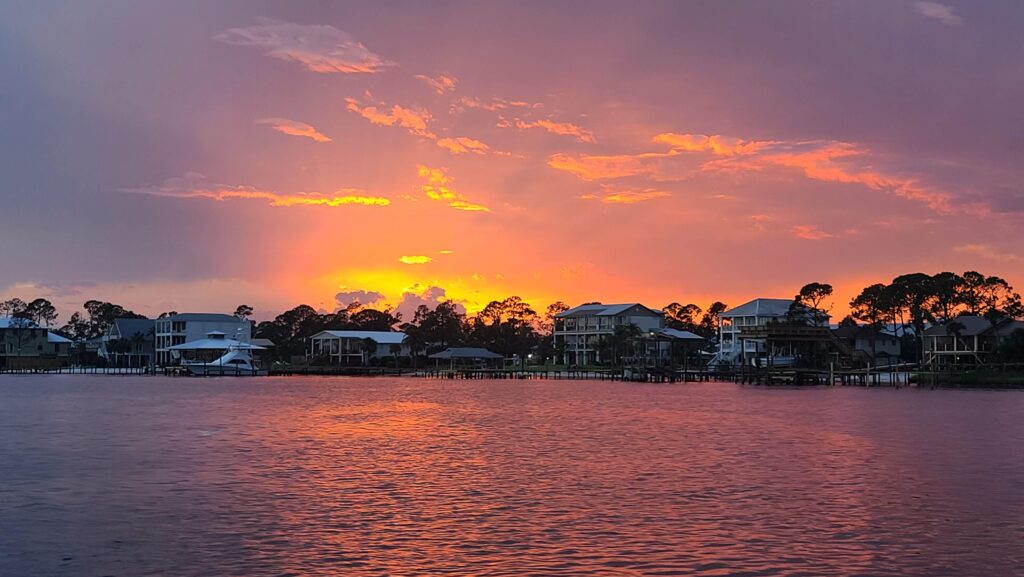 private sunset cruise orange beach dolphin evening boat tour